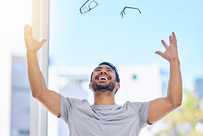 Man gets rid of glasses after LASIK eye surgery.
