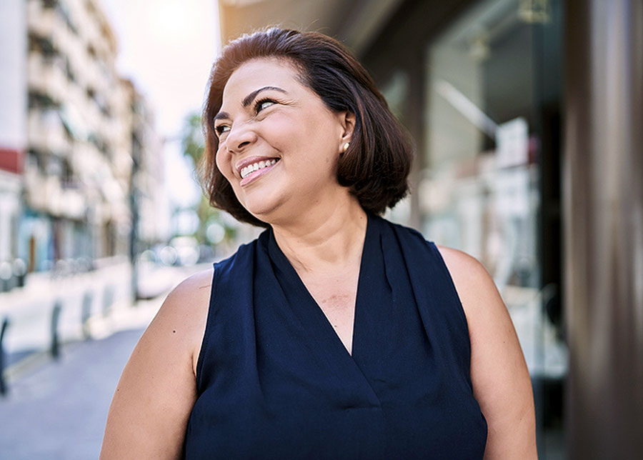 can I have LASIK twice woman smiling outdoors