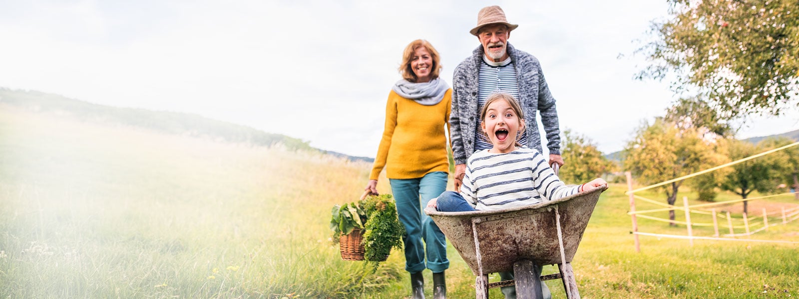 amily enjoying time outdoors together, representing clear vision and an active lifestyle