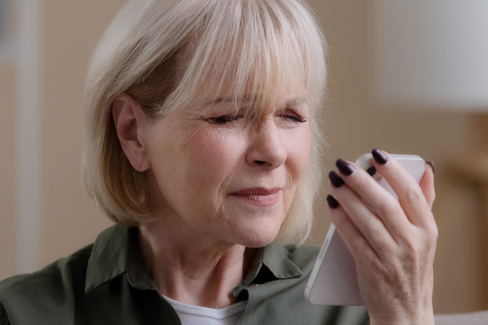 Woman squinting due to macular edema symptoms.